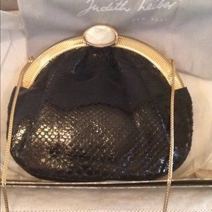 Judith Leiber black snake skin evening bag.